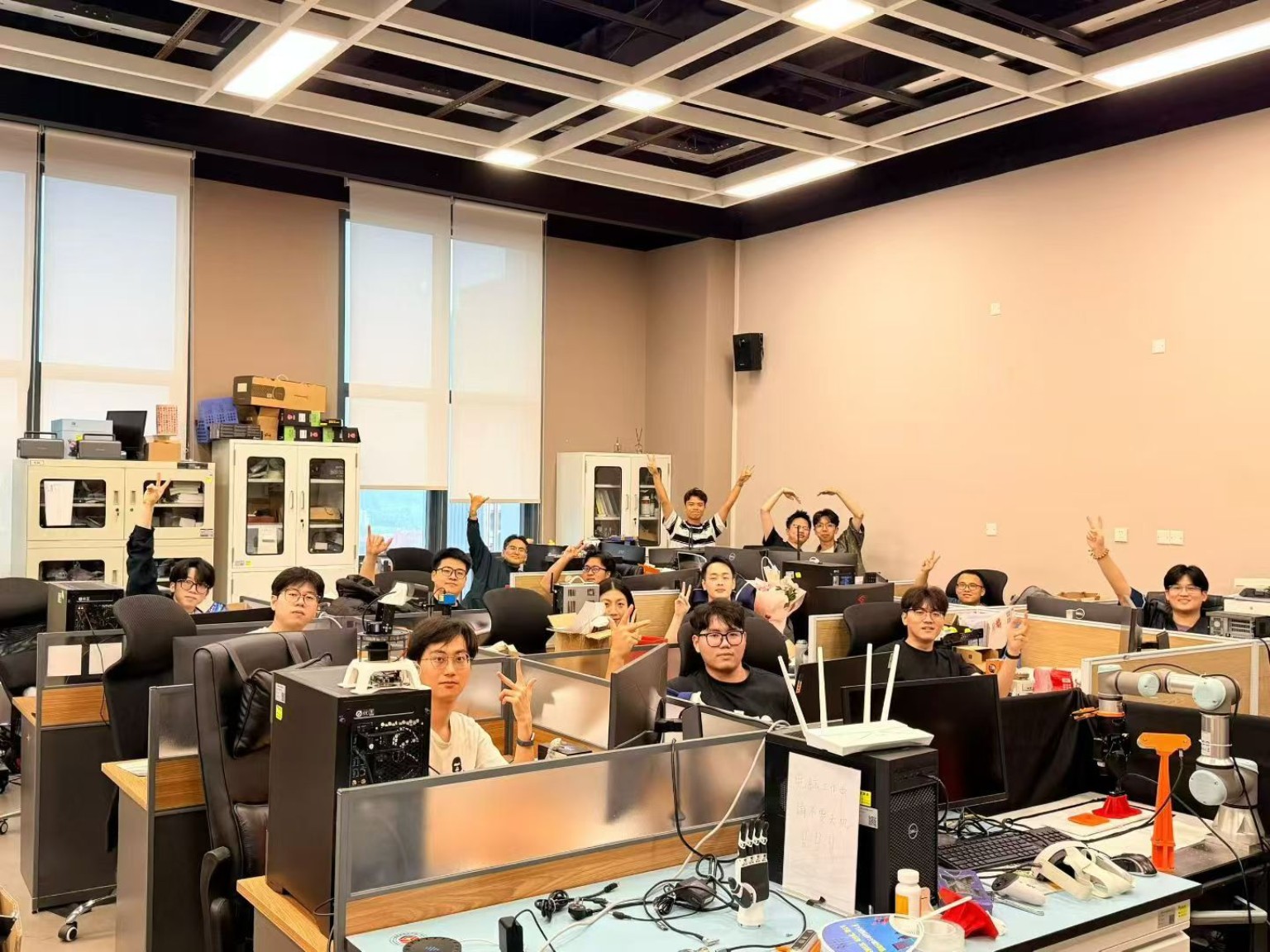 Laboratory members with robotics research platforms